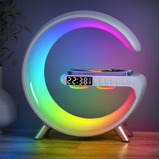 Desk lamp with a wireless charging pad in the base
